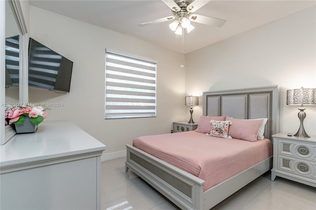 bedroom with light tile patterned floors and ceiling fan