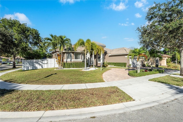 view of front of home with a front lawn