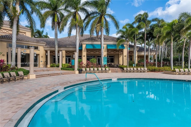 view of swimming pool featuring a patio