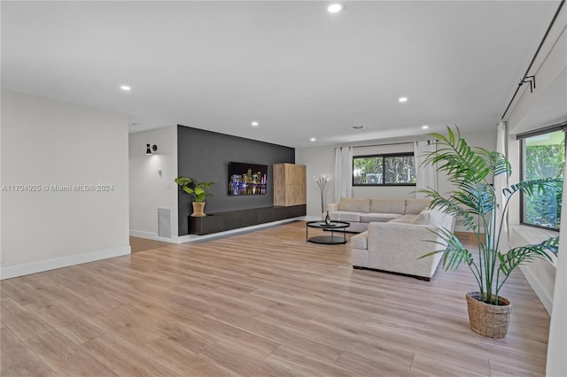 living room with light hardwood / wood-style floors