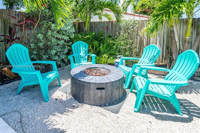 view of patio with an outdoor fire pit