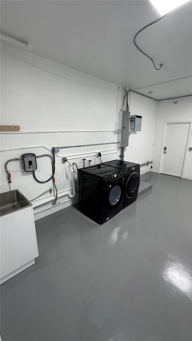 interior space with washer and dryer and electric panel