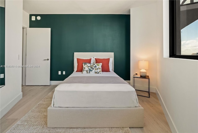 bedroom featuring light hardwood / wood-style floors