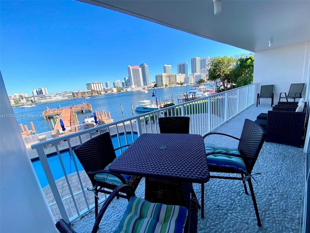 balcony featuring a water view