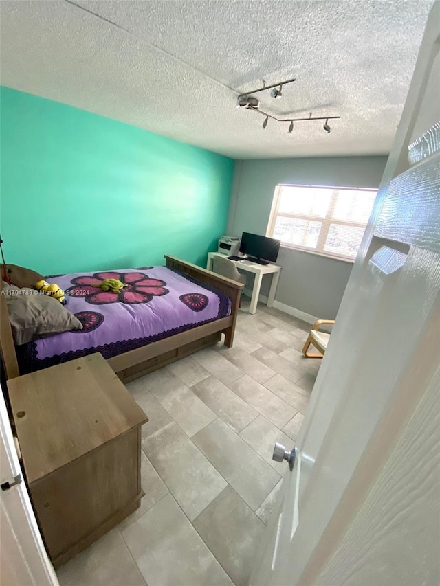 bedroom with a textured ceiling