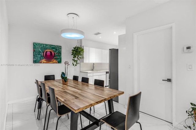 dining area with sink