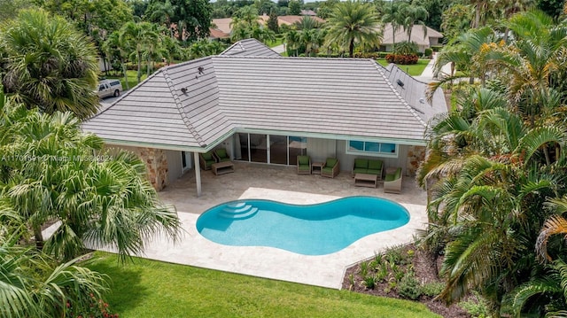 view of swimming pool with a patio