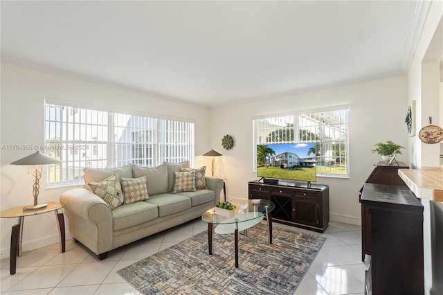 living room featuring crown molding, plenty of natural light, and light tile patterned floors