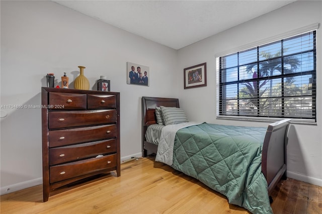 bedroom featuring light hardwood / wood-style floors