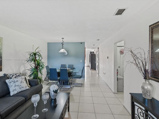 living room with light tile patterned floors