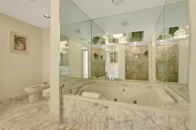 bathroom featuring toilet, a bidet, and independent shower and bath