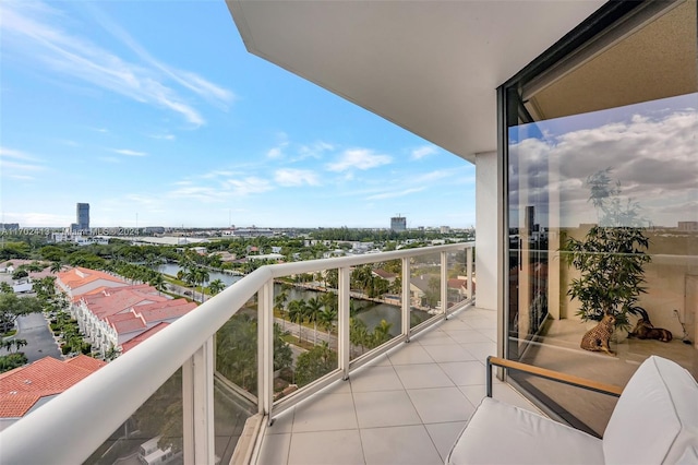 balcony featuring a water view