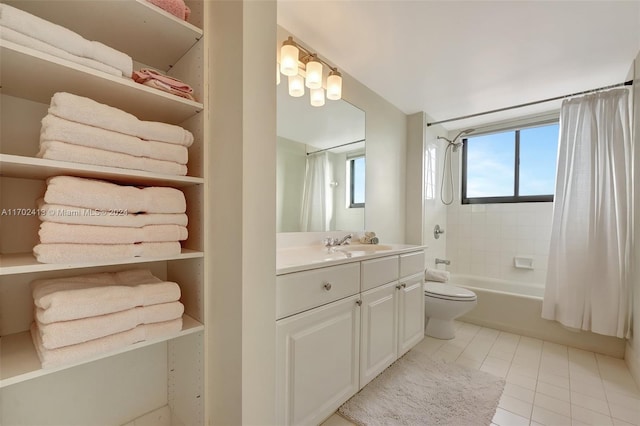 full bathroom with tile patterned flooring, shower / bath combo, vanity, and toilet