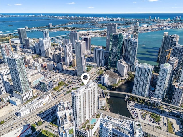 birds eye view of property featuring a water view