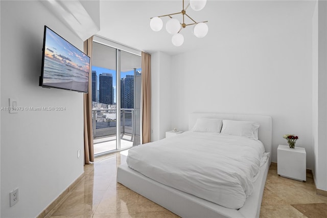 bedroom with expansive windows, access to outside, and an inviting chandelier