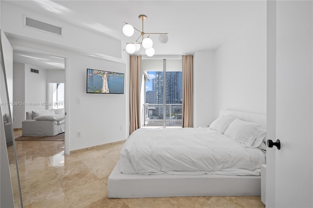 bedroom with an inviting chandelier