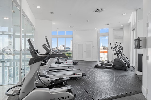 exercise room with a wall of windows