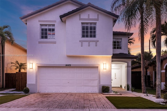 view of front of home with a garage