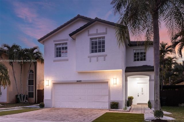 view of front of property featuring a garage