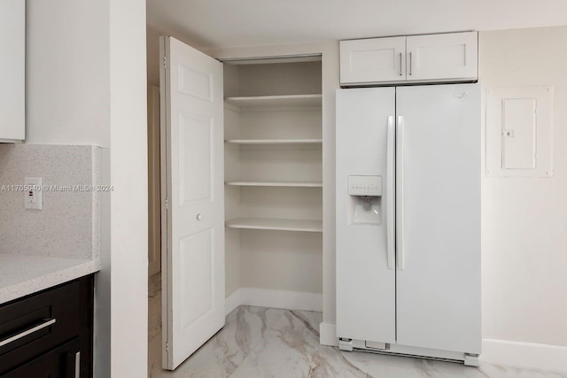 pantry featuring electric panel