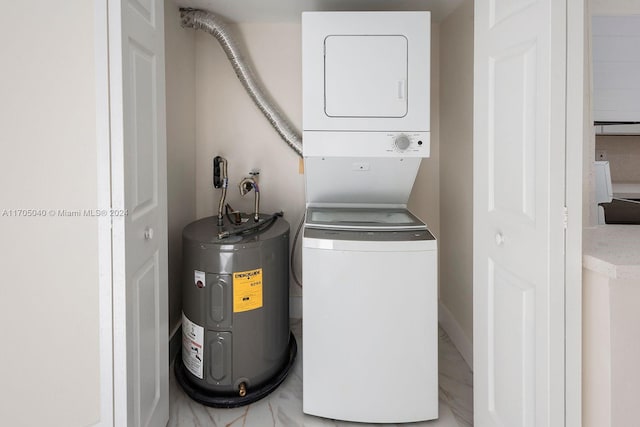 laundry room with electric water heater and stacked washer and dryer