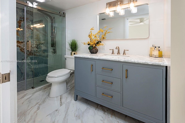 bathroom with ceiling fan, toilet, vanity, and walk in shower