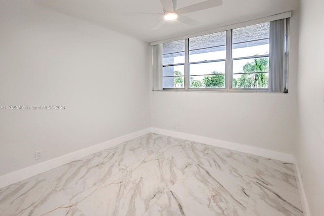 unfurnished room featuring ceiling fan