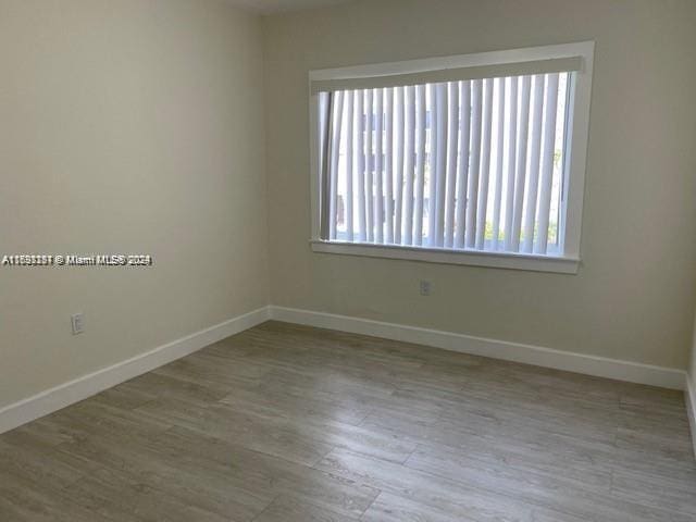 empty room featuring light hardwood / wood-style flooring