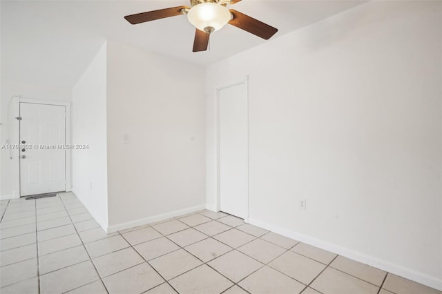 unfurnished room with light tile patterned floors