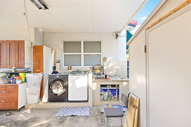 washroom with washer and clothes dryer