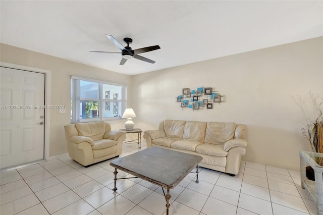 tiled living room featuring ceiling fan