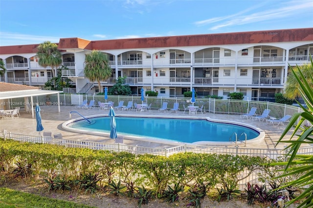 view of swimming pool featuring a patio