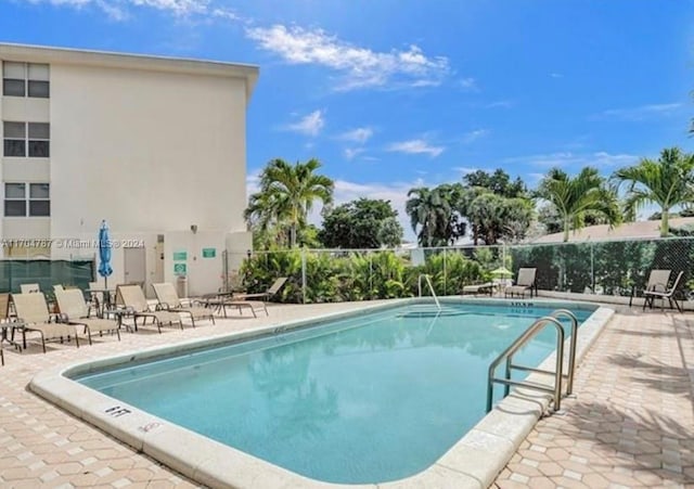 view of pool with a patio