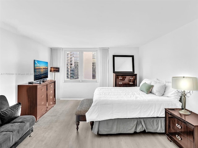 bedroom featuring light wood-type flooring