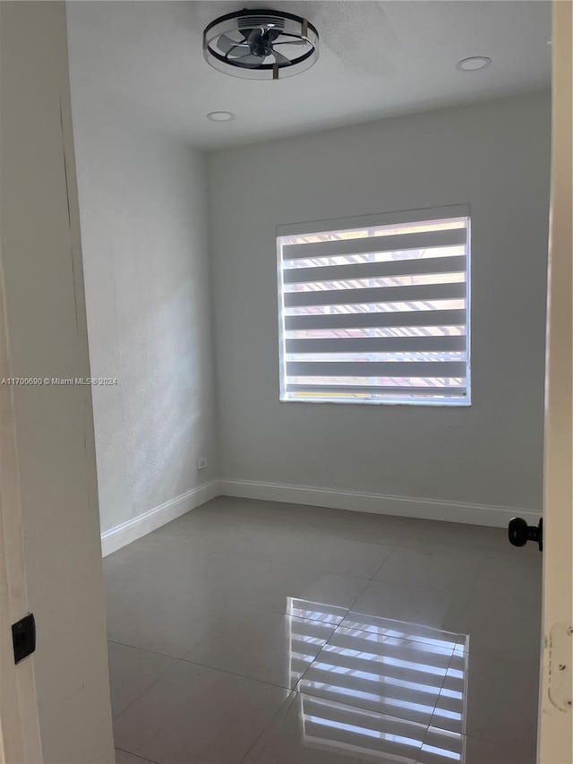 view of tiled spare room