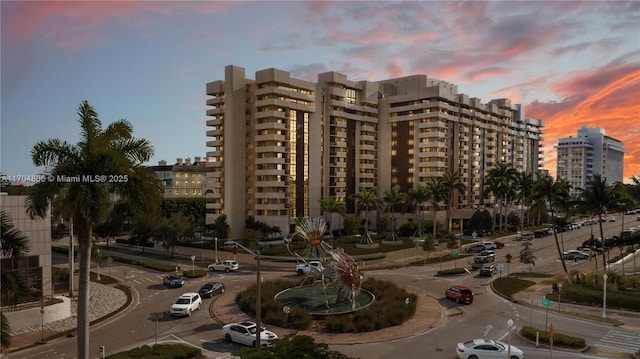 view of outdoor building at dusk