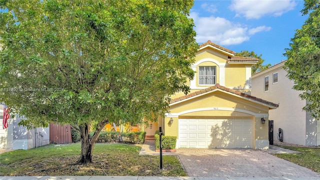 view of front of property featuring a garage