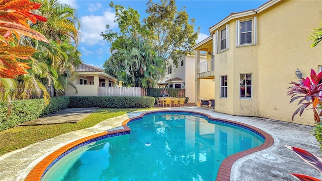 view of pool featuring a patio