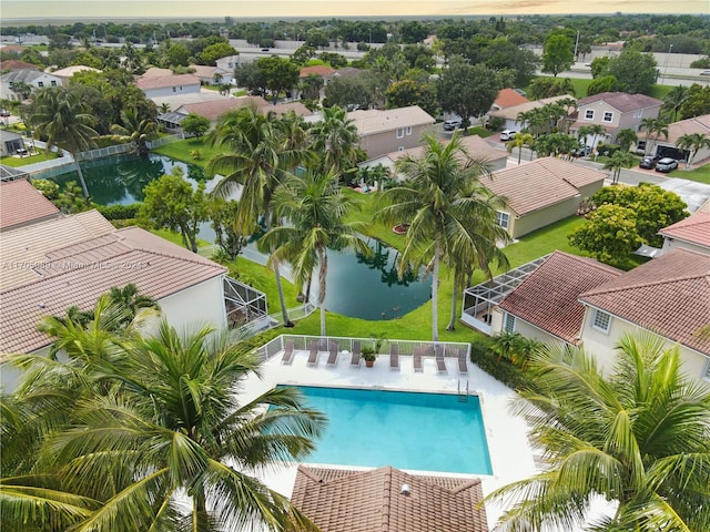 view of pool featuring a water view