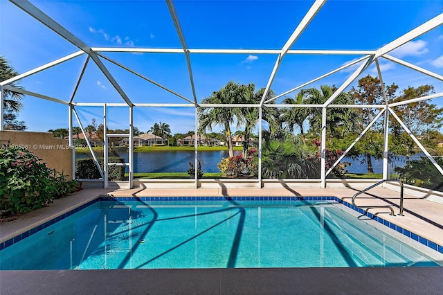 view of swimming pool featuring a lanai, a water view, and a patio