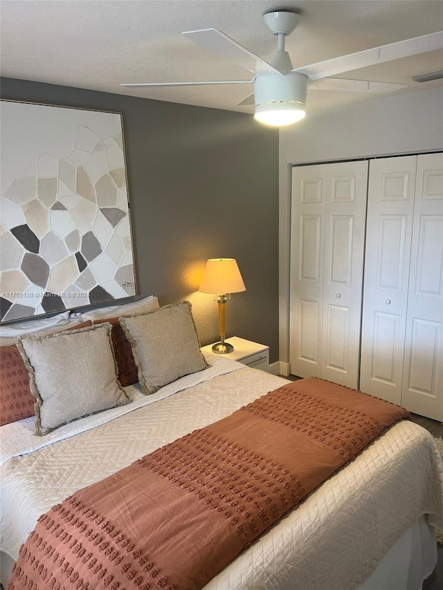 bedroom featuring a closet and ceiling fan