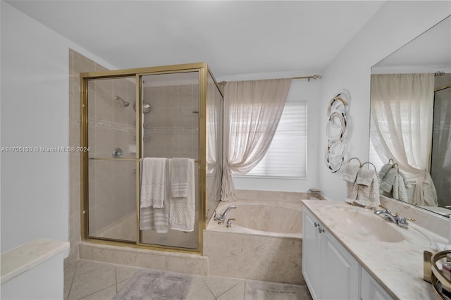 bathroom featuring tile patterned flooring, vanity, and independent shower and bath