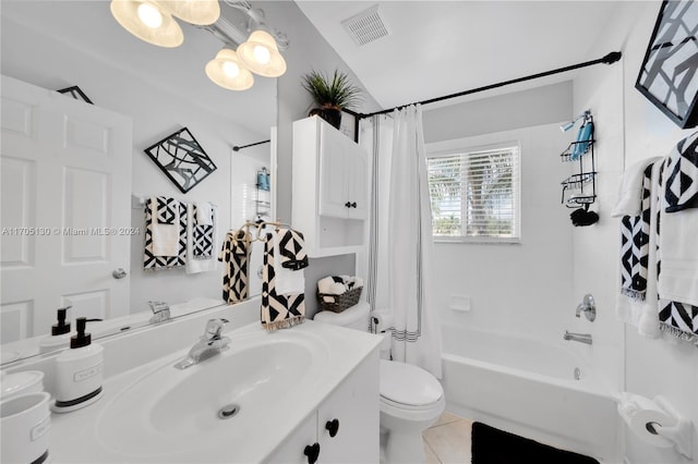 full bathroom featuring tile patterned flooring, vanity, shower / tub combo, and toilet