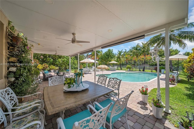 view of swimming pool with an outdoor living space, a patio, ceiling fan, and a gazebo