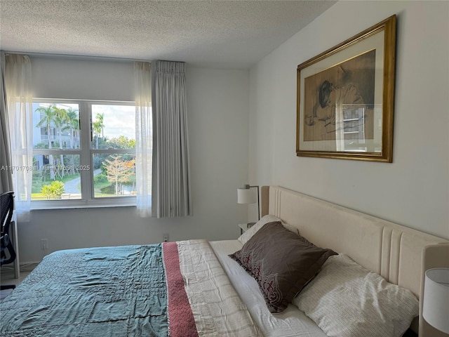 bedroom featuring a textured ceiling