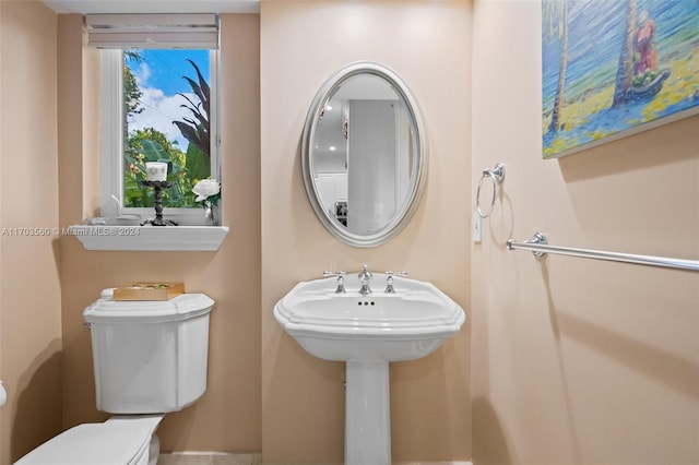 bathroom featuring toilet