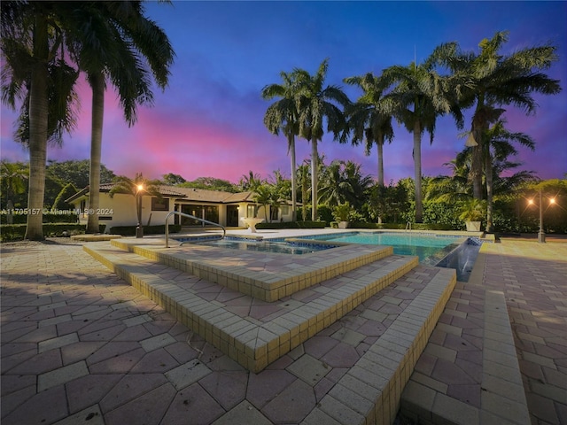 pool with a patio