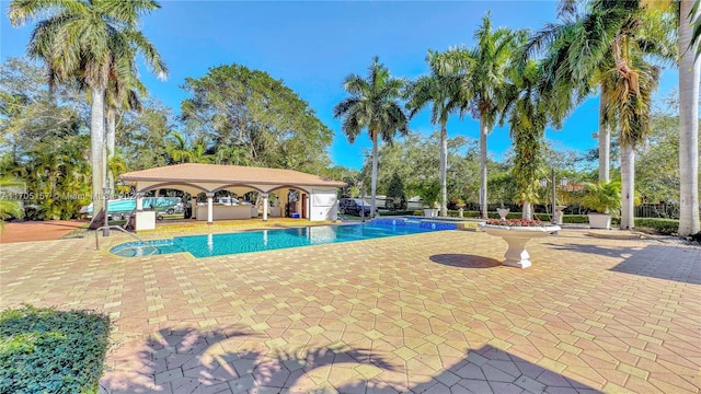 pool with a patio