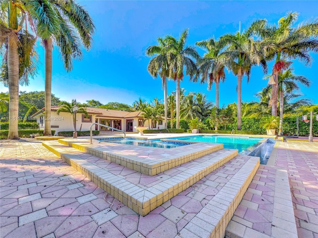 outdoor pool with a patio