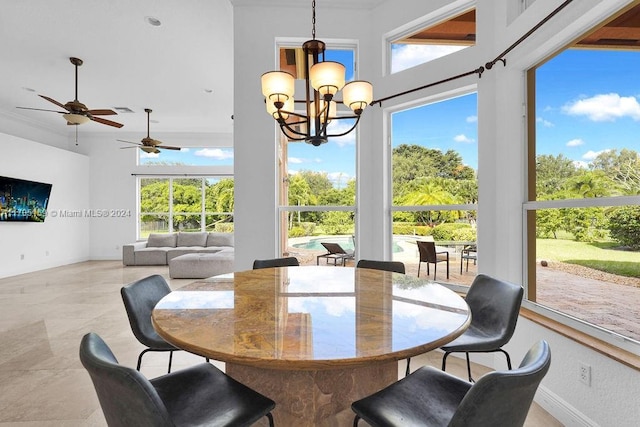 tiled dining room featuring ceiling fan with notable chandelier